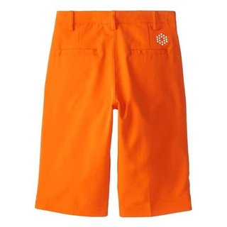 Puma Golf Tech junior shorts, vibrant orange