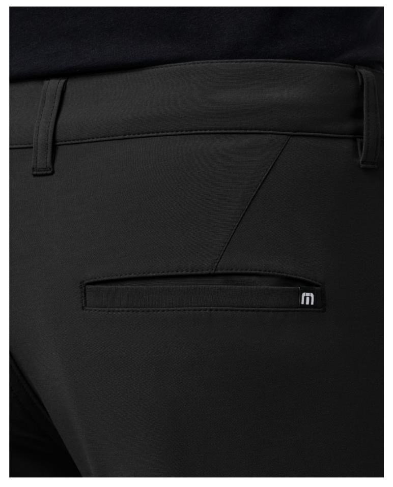Travis Mathew Open To Close Tech Chino heren broek, zwart