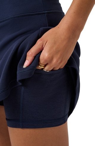 Travis Mathew Skyloft Soft dames rok, navy blazer