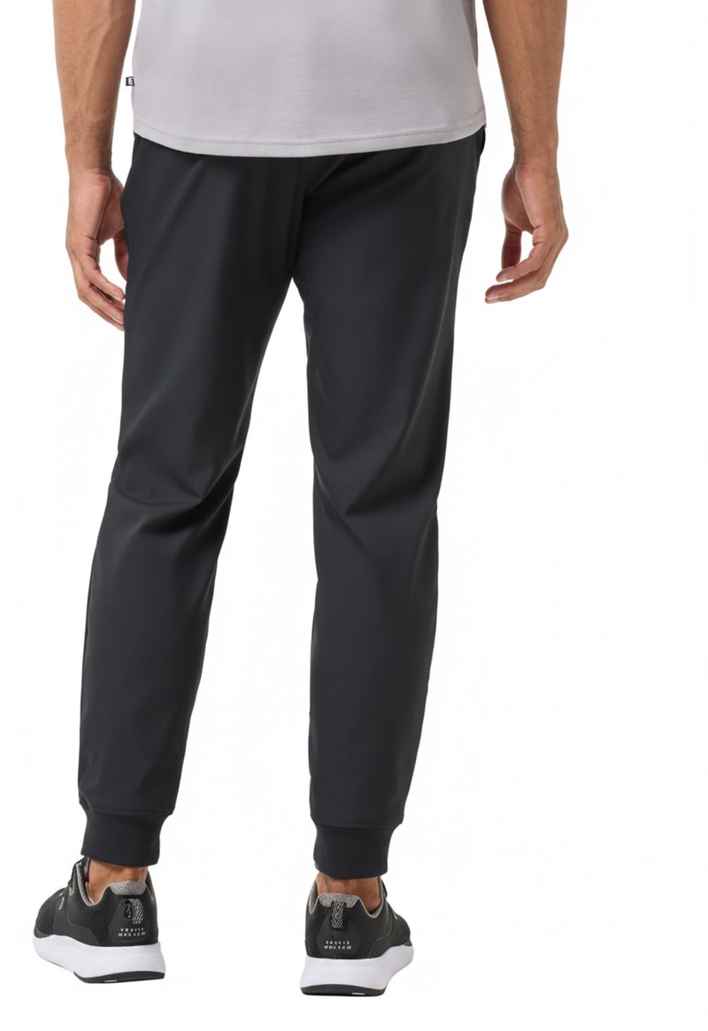 Travis Mathew Open To Close 2.0 Jogger heren broek, zwart