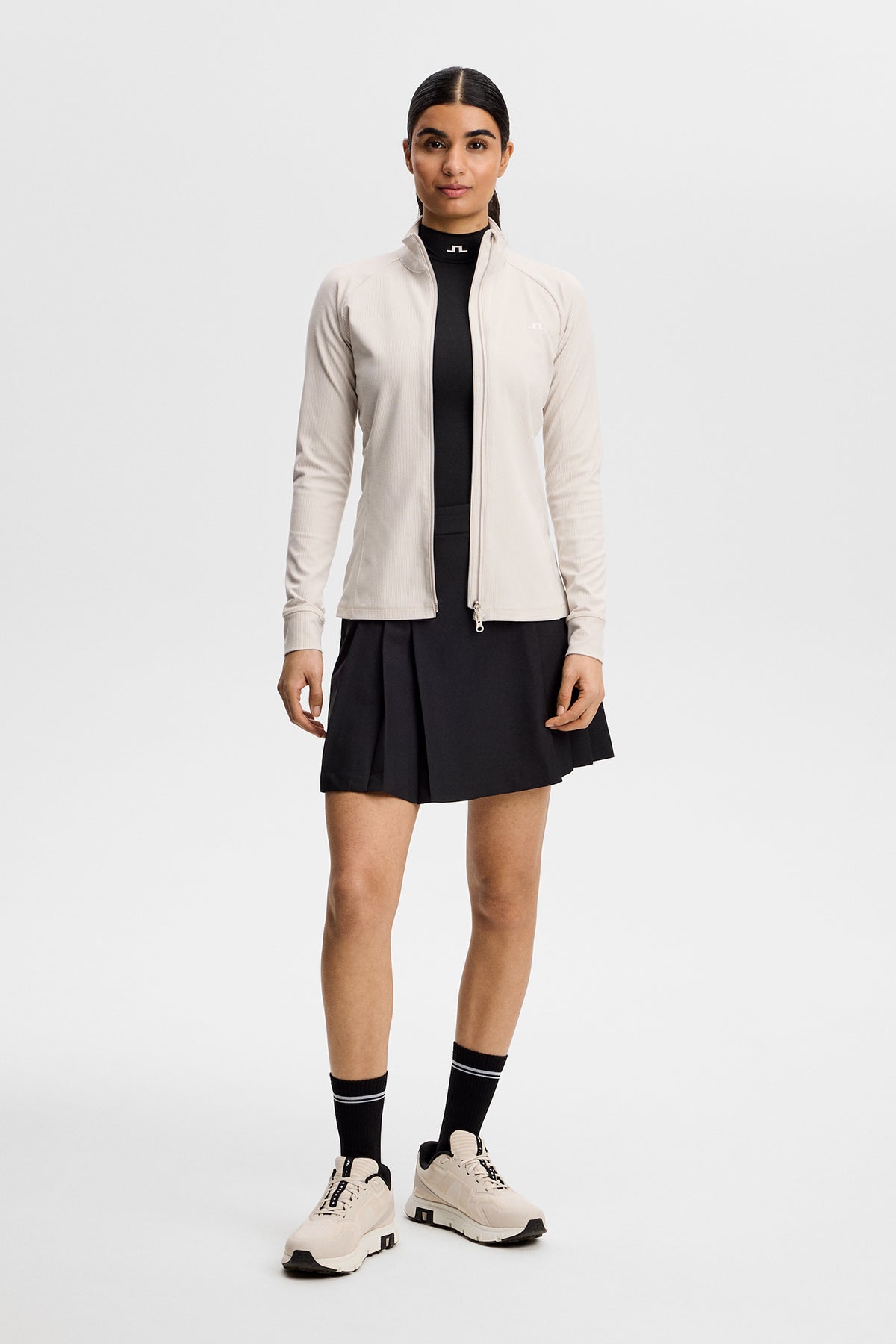 J.Lindeberg Mel Rib Mid Layer Moonbeam – detail van de stof op de baan