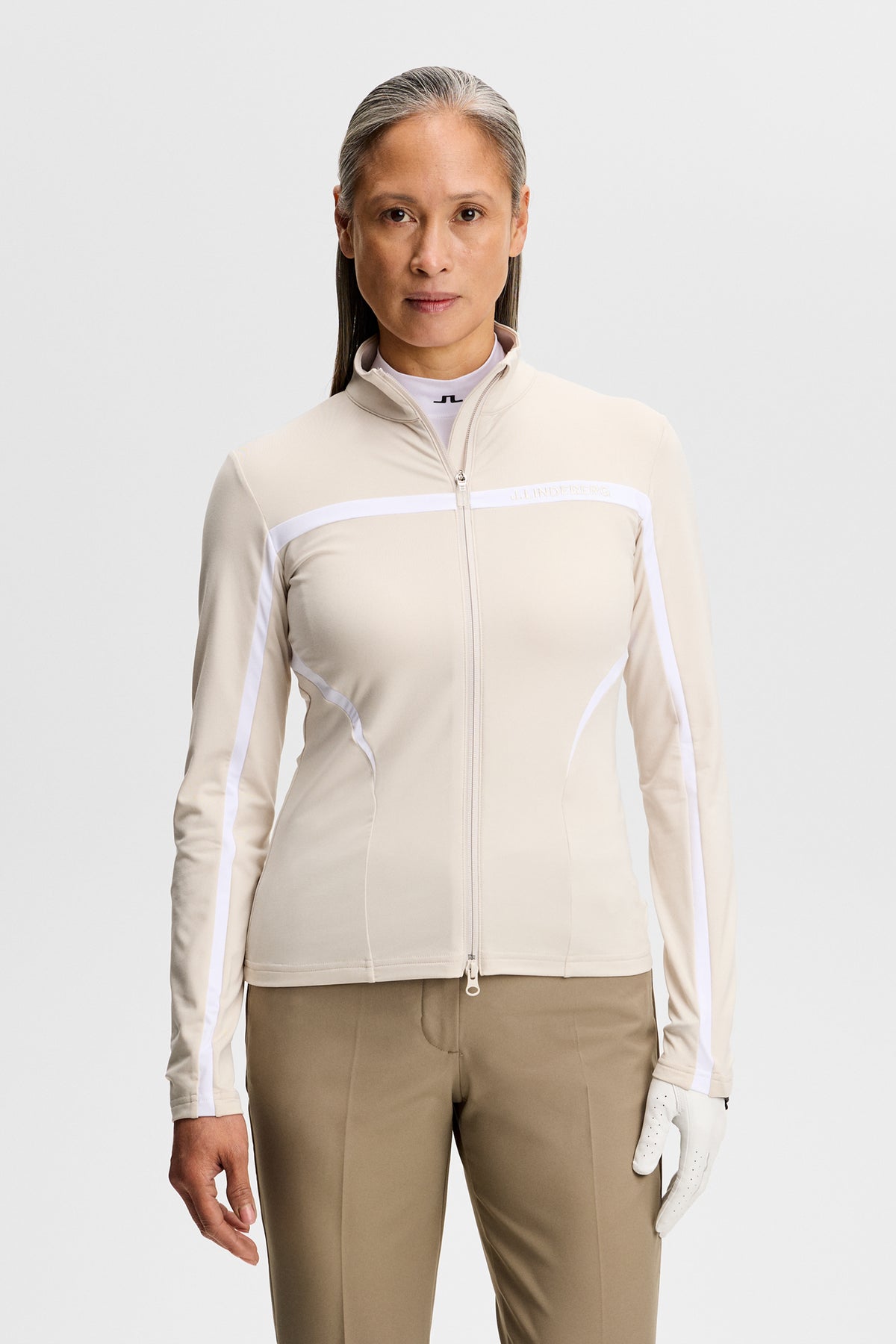 J.Lindeberg Janice Mid Layer Moonbeam – vooraanzicht met Light Mid stof en ritsdetail