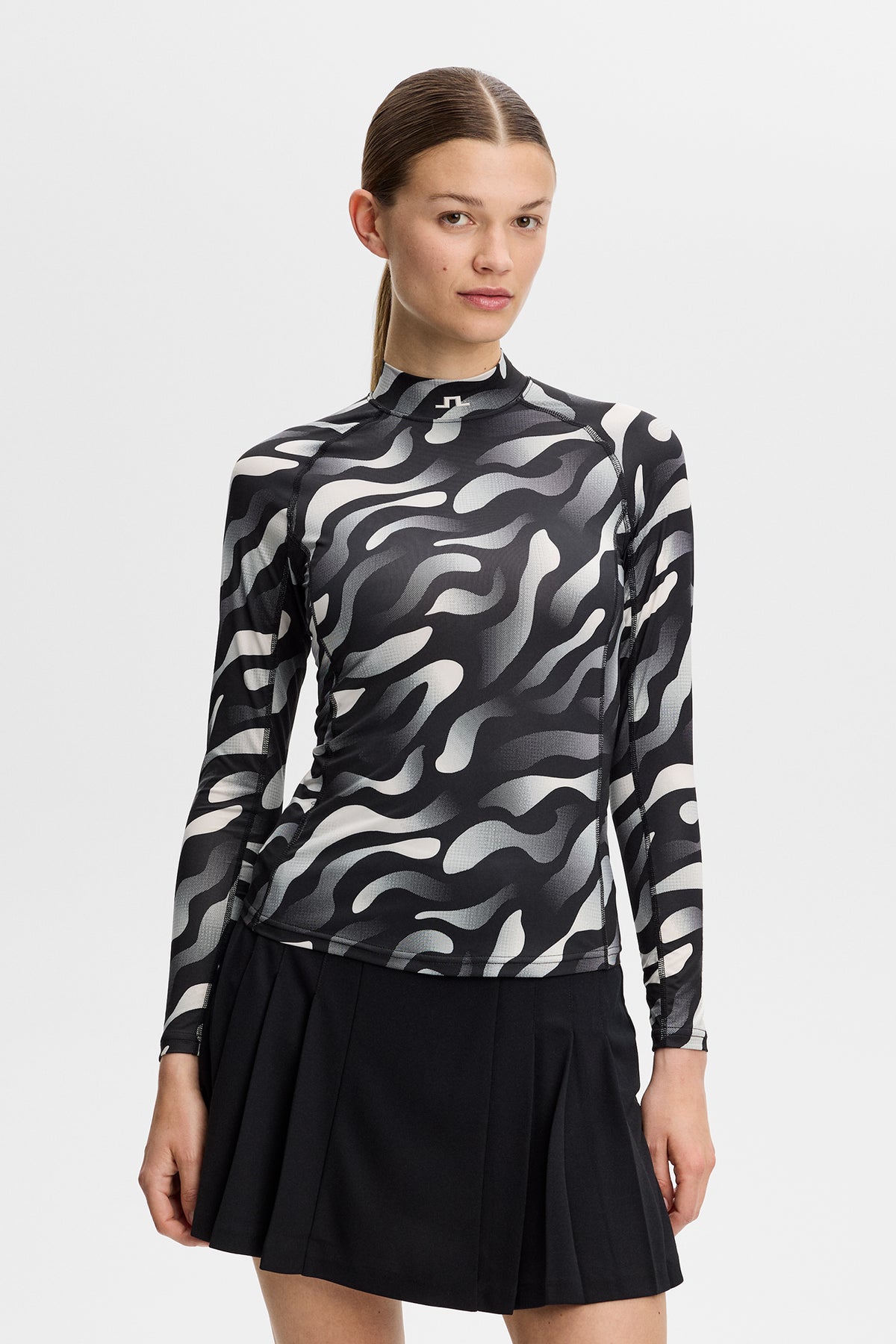 J.Lindeberg Ella Print Compression Top Bunker Fade Black Moonbeam - zijaanzicht op de baan