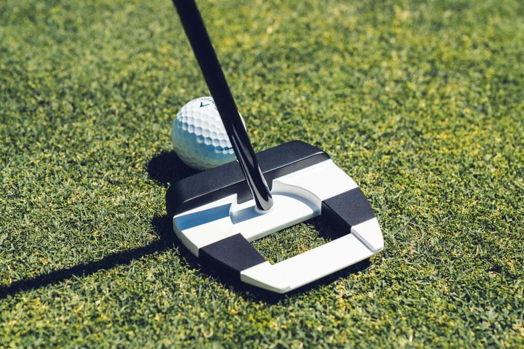 Odyssey Ai-DUAL Square 2 Square Jailbird putter op de green